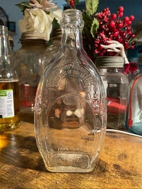1940 clear Embossed Glass Bottle - Vintage barrel style